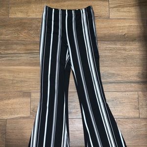 Black and white striped flare leg pants